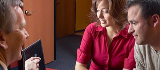 Couple meeting with credit counselor